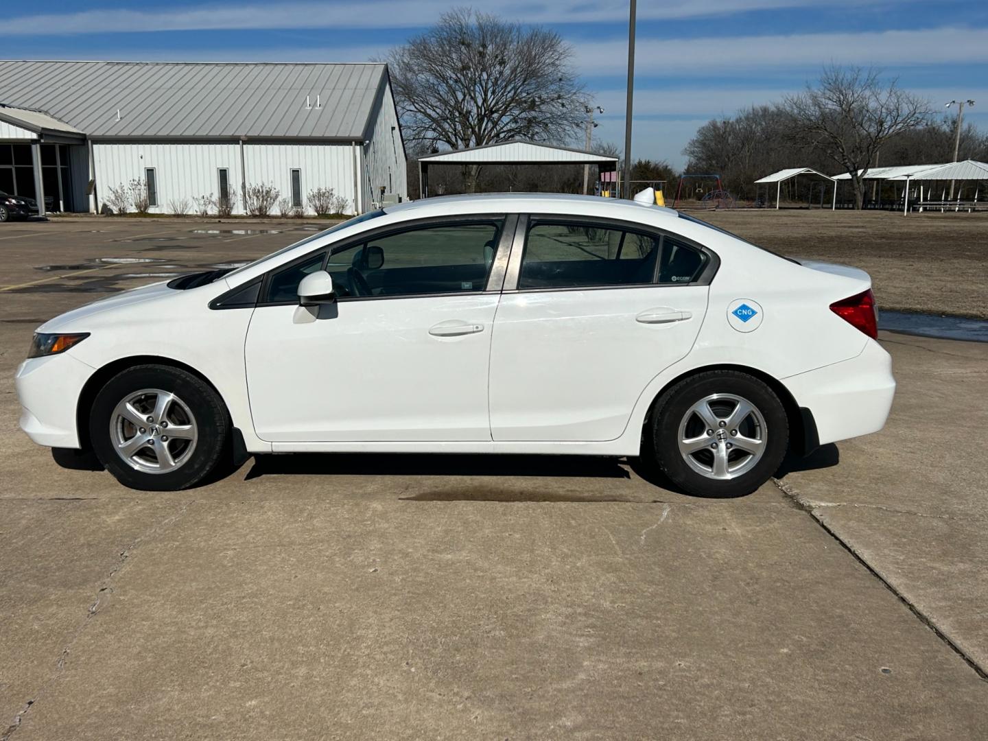 2012 White /Gray Honda Civic CNG Sedan 5-Speed AT (19XFB5F58CE) with an 1.8L L4 SOHC 16V CNG engine, 5-Speed Automatic transmission, located at 17760 Hwy 62, Morris, OK, 74445, (918) 733-4887, 35.609104, -95.877060 - 2012 HONDA CIVIC 1.8L FWD DEDICATED CNG (COMPRESSED NATURAL GAS) VEHICLE. FEATURES REMOTE KEYLESS ENTRY, POWER LOCKS, POWER WINDOWS, POWER MIRRORS, MANUEL SEATS, AM/FM RADIO, CD PLAYER, USB, AUX, BLUETOOTH FOR HANDS-FREE CALLING, 12V POWER OUTLET, CRUISE CONTROL, TRACTION CONTROL, CLOTH SEATS, 195/6 - Photo#7